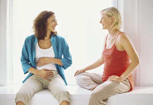 Two Pregnant Women Talking