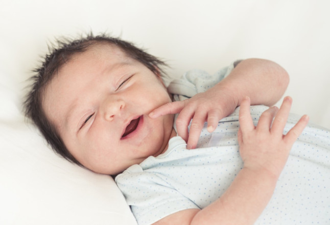 Portrait of newborn baby boy (0-1 months)